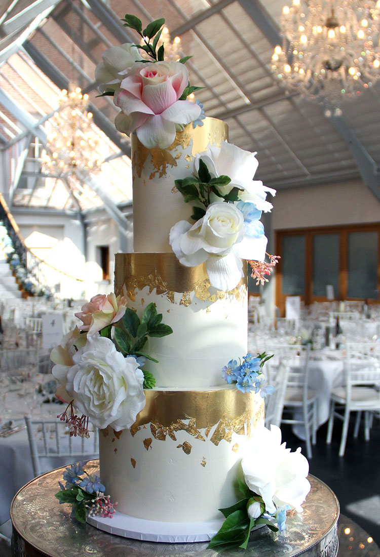 Gold & White Wedding Cake with Pastel Flowers