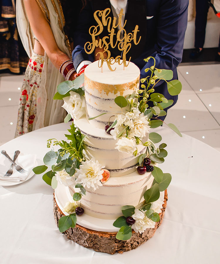 Semi Naked Wedding Cake with Wild Foliage