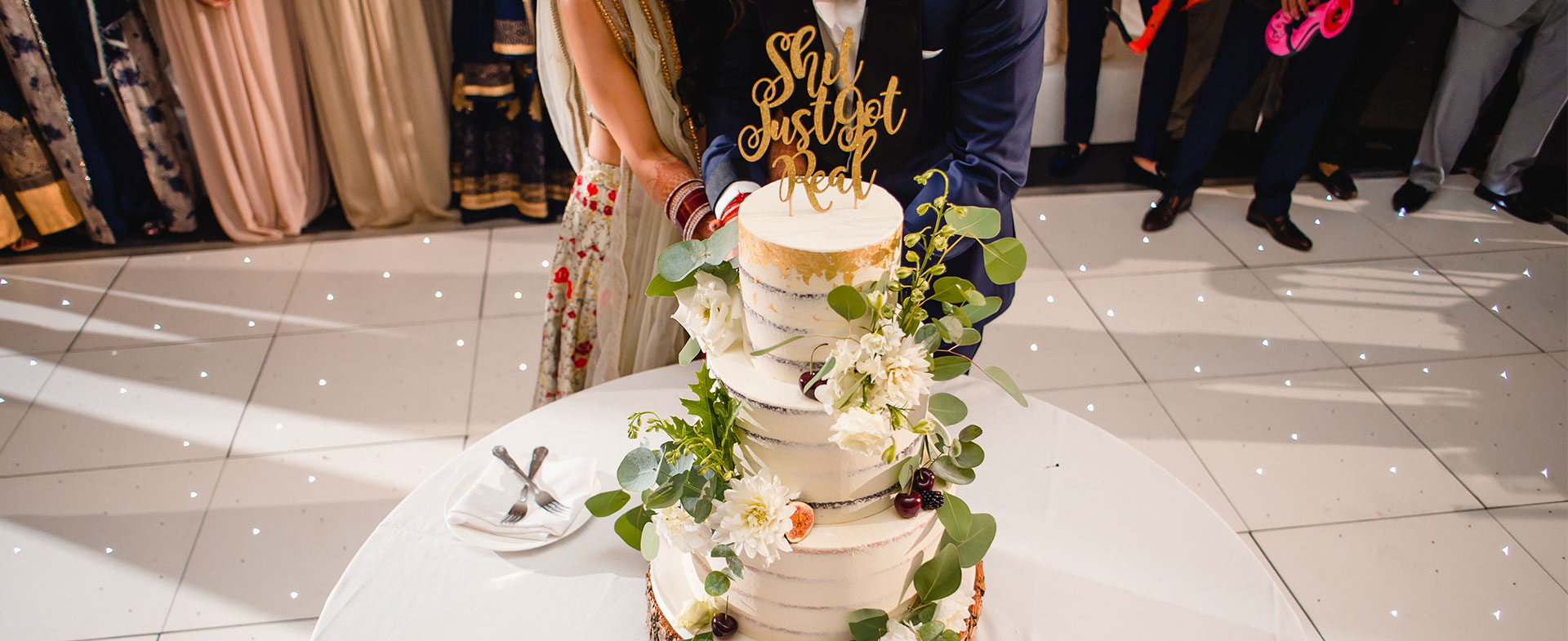 Semi Naked Wedding Cake with Wild Foliage Full