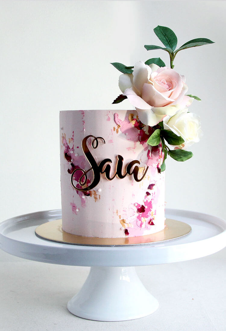 Painted Pink Celebration Cake with Flowers & Cake Charm